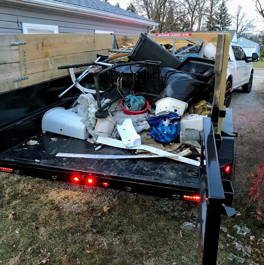 Roll-off dumpster delivered to a residential driveway in Perry